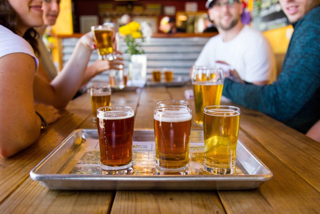 Group of guests enjoying local beers