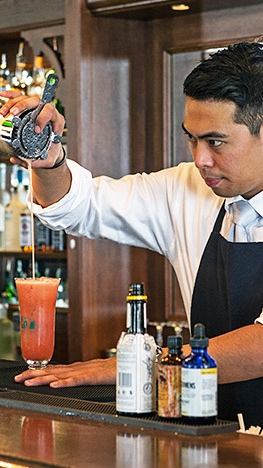 Mixologist preparing cocktails