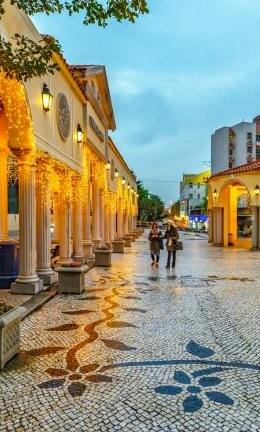 Walking along mosaic plaza