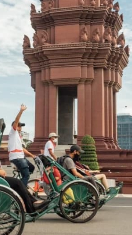 Cycles through a city street