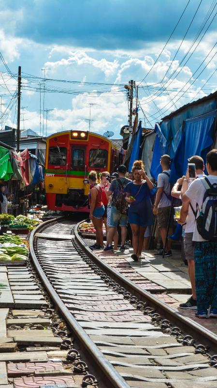 Multicolored train on railroad tracks