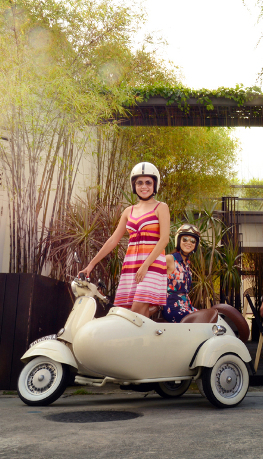 White Vespa with side car