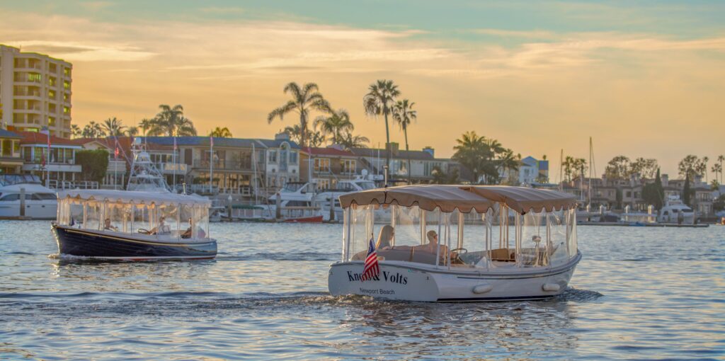 Duffy Boats cruising down Newport harbor