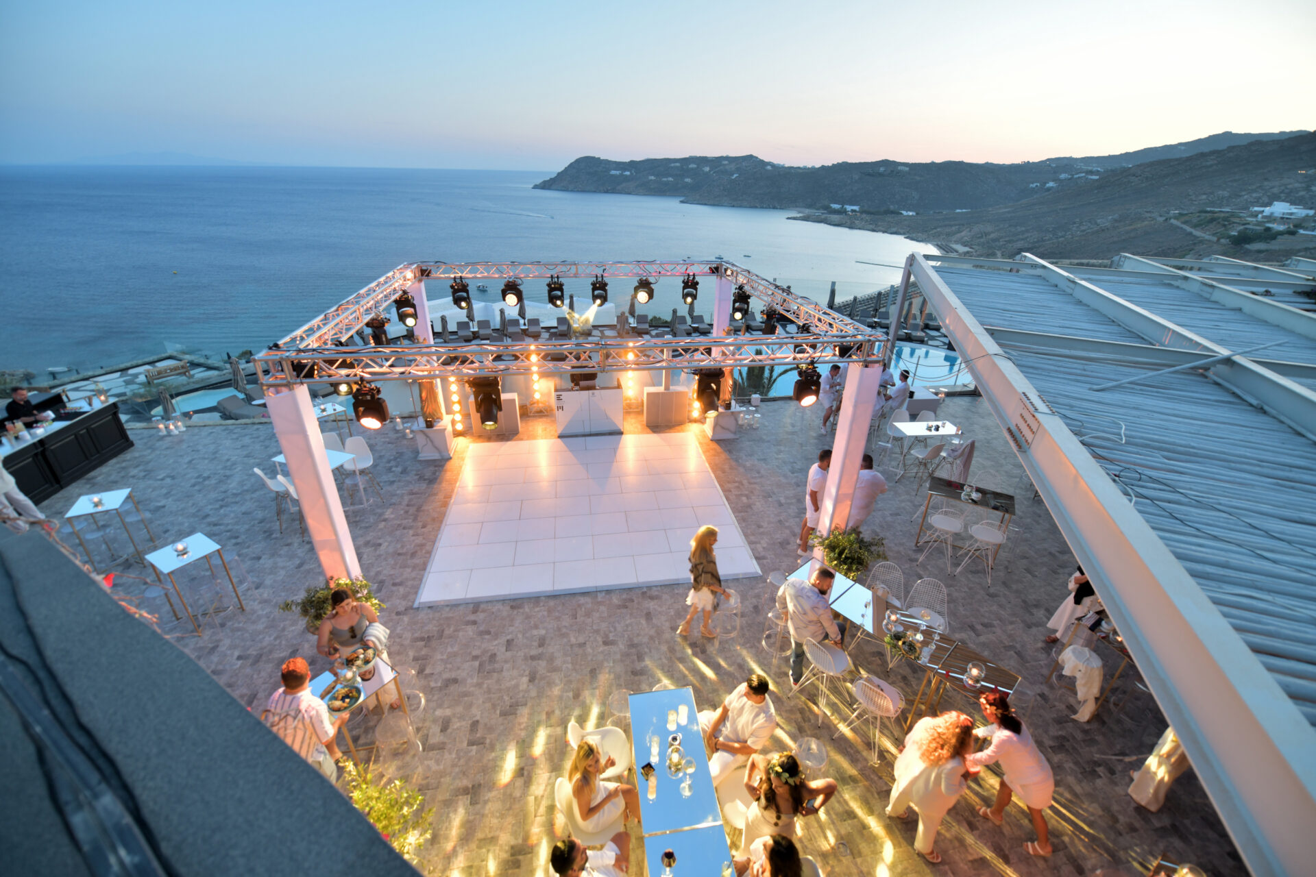 Aerial view of people enjoying an event on the beach