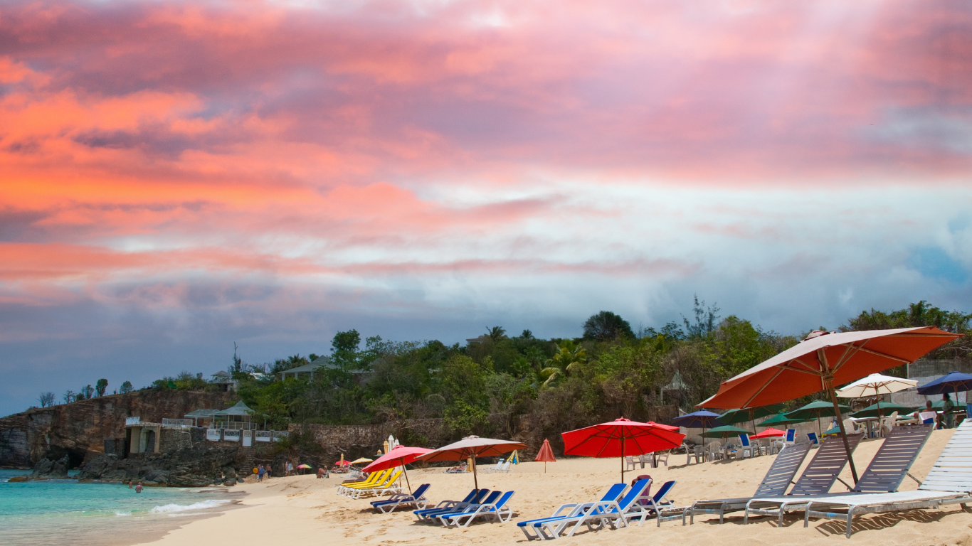 Lounge seats with umbrellas on the beach