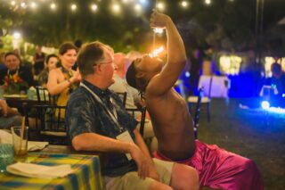 Fire Eating at a Group Dinner