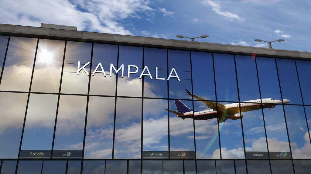 Airplane Landing At Kampala Uganda Airport Mirrored In Terminal. Uganda—Africa's pearl for meetings and incentives, featuring stunning landscapes, world-class venues, and rich cultural heritage, offering a unique blend of adventure and professionalism for events.