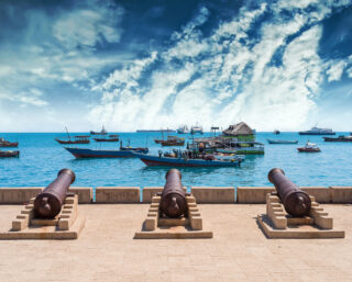 Historic cannons in Stone Town, Zanzibar, symbolizing the rich cultural heritage and colonial history of this UNESCO World Heritage Site in Tanzania.