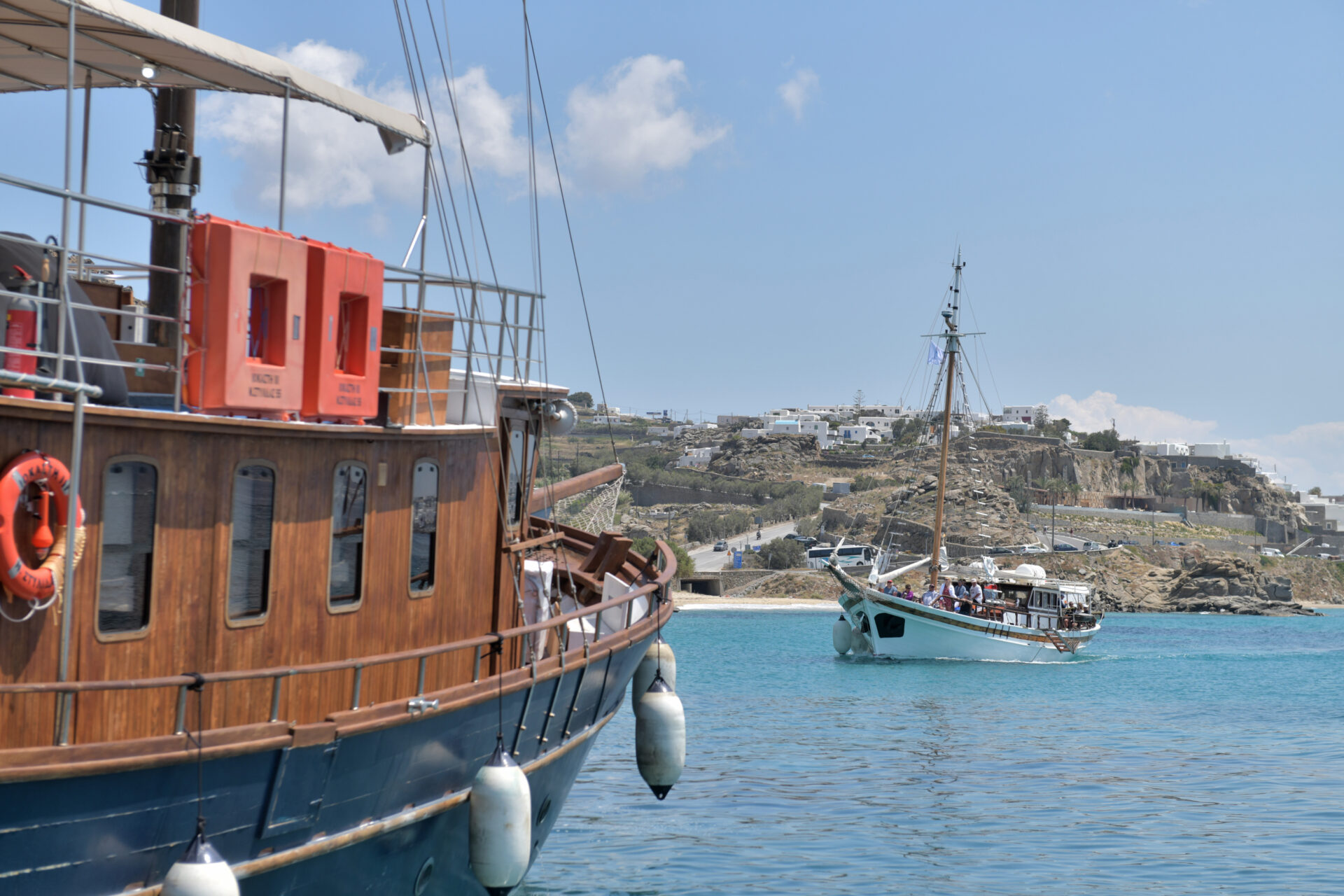 Two boats sailing in the water.