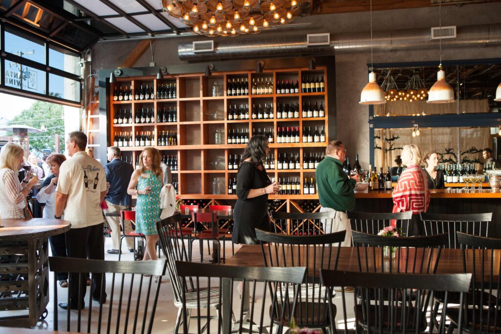 Guests enjoying wine at a local restaurant in the funk zone