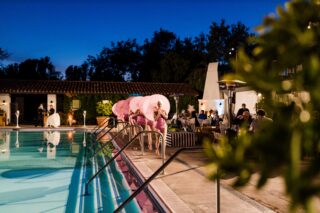 Synchronized swimming routine with 5 ladies in the water