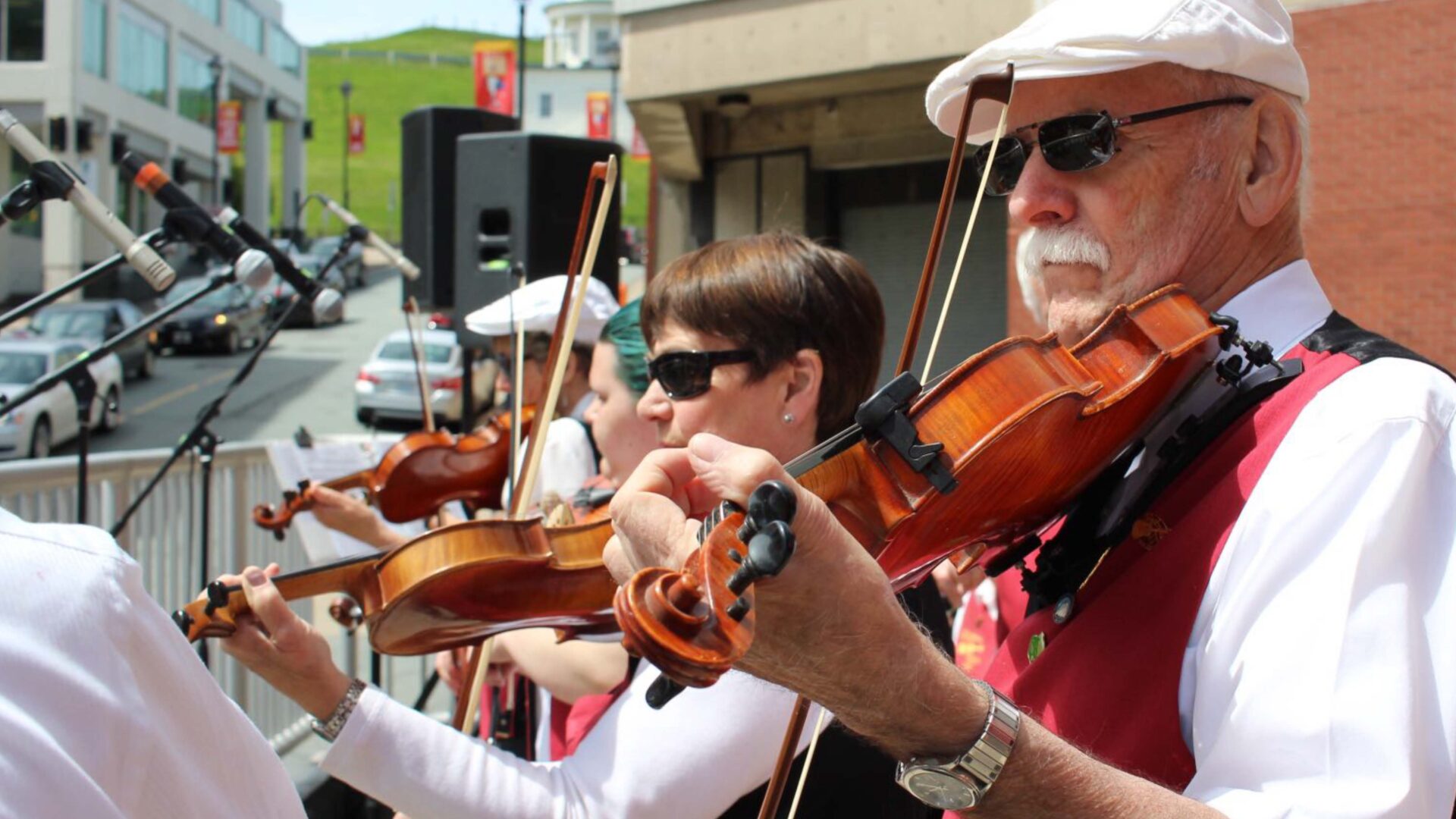 Fiddlers performing