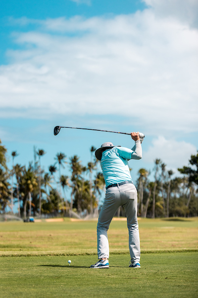 Man playing golf