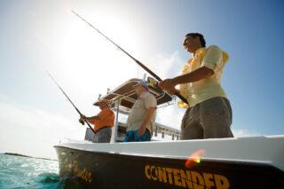 Group of men fishing on a boat