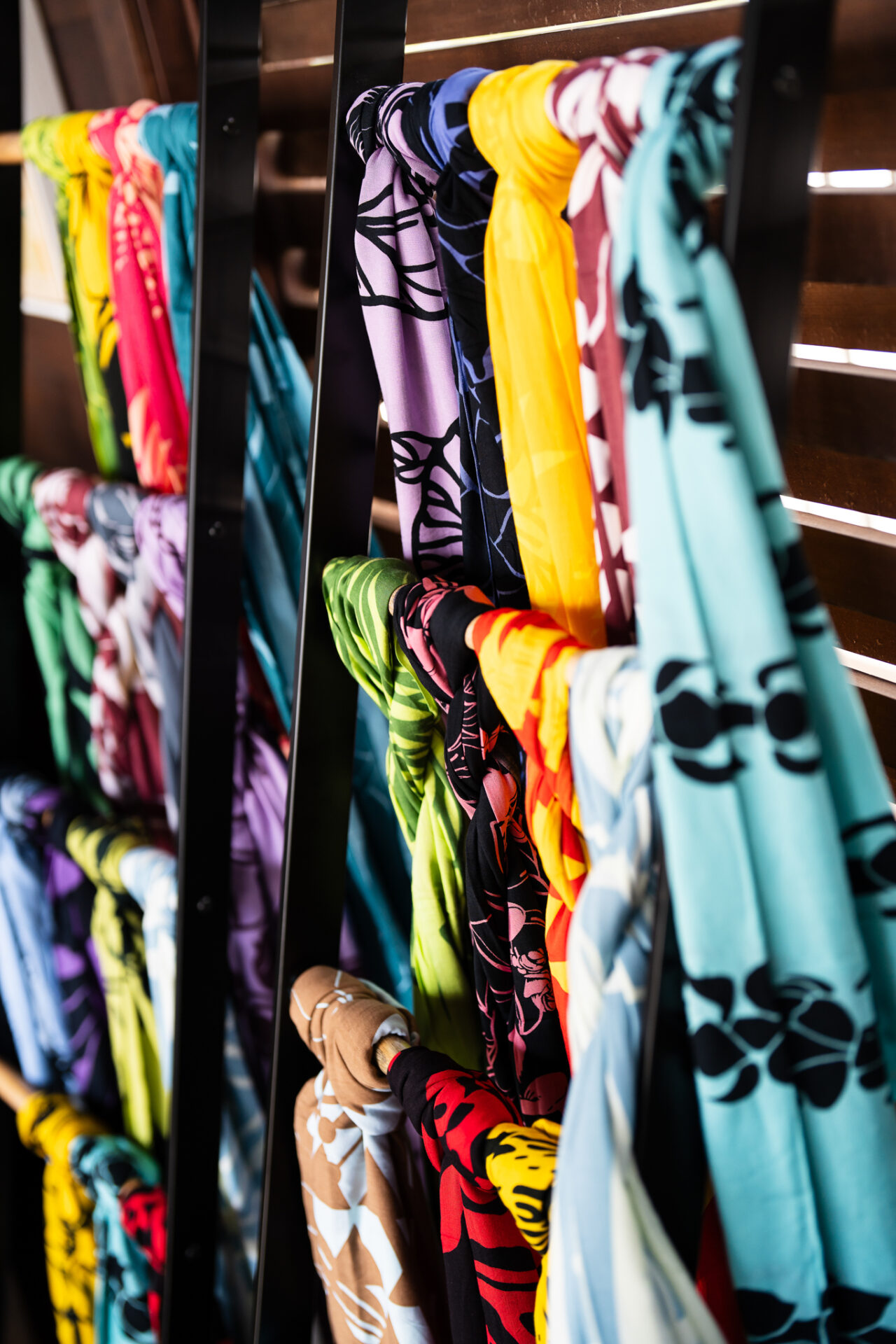 Colorful display of Hawaiian scarfs.