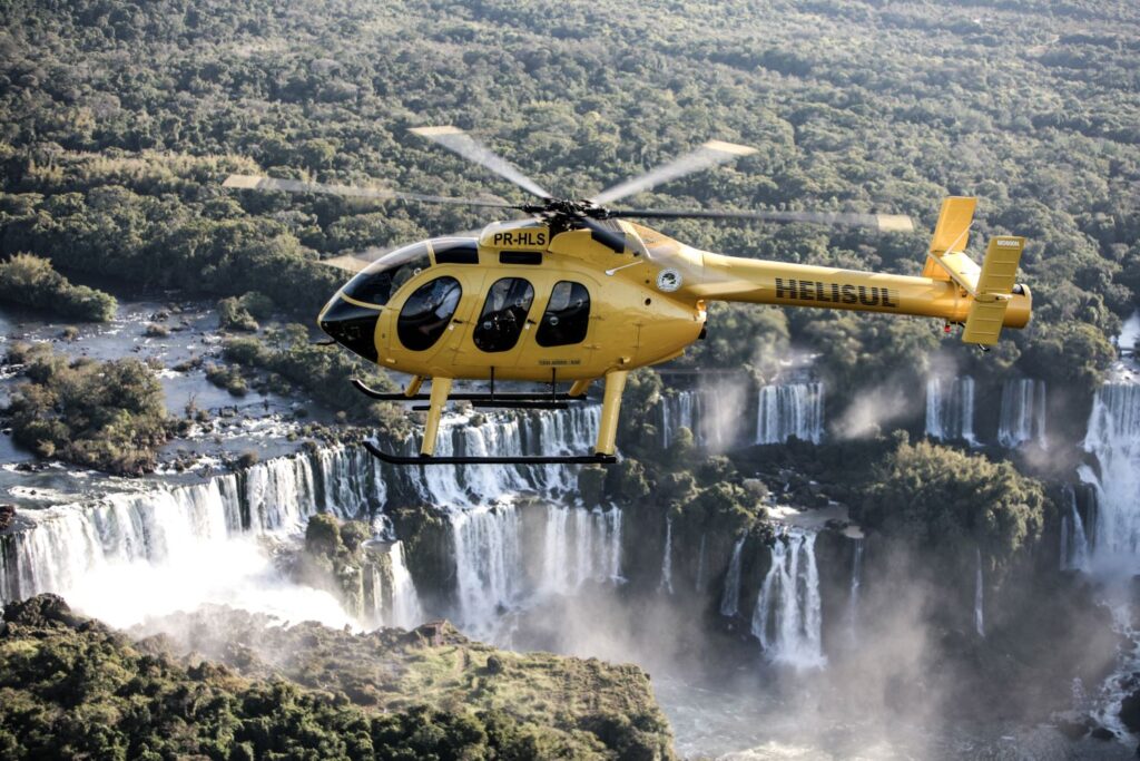 Helicopter flying over the falls
