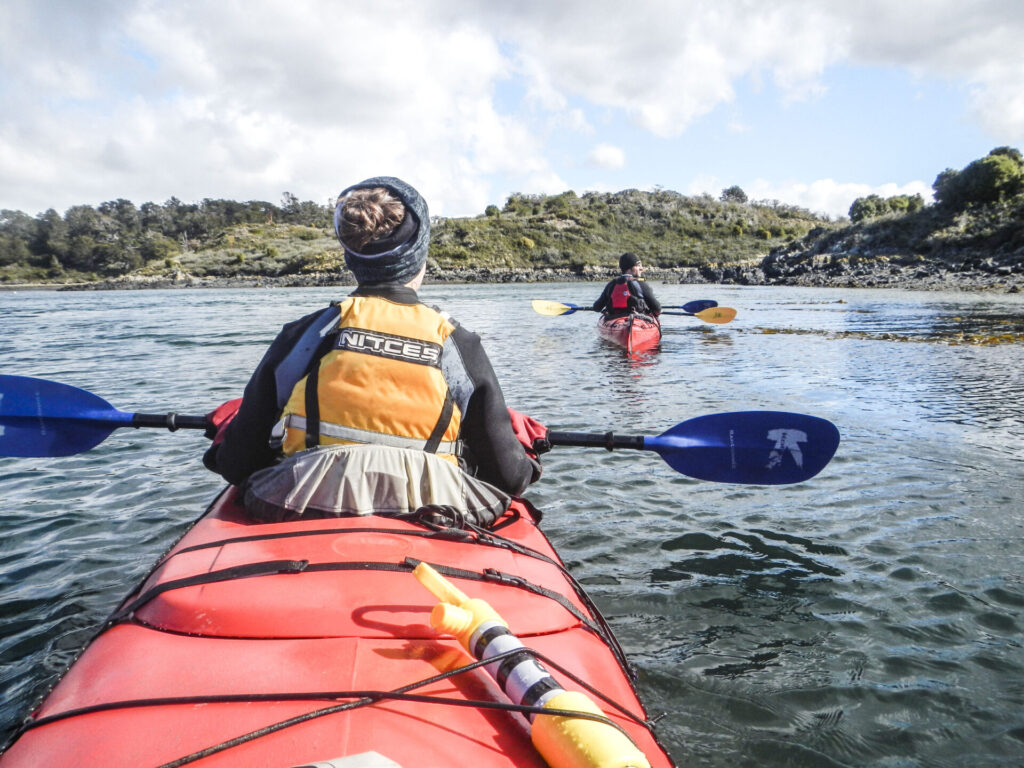 People kayaking along the Beagle Channel