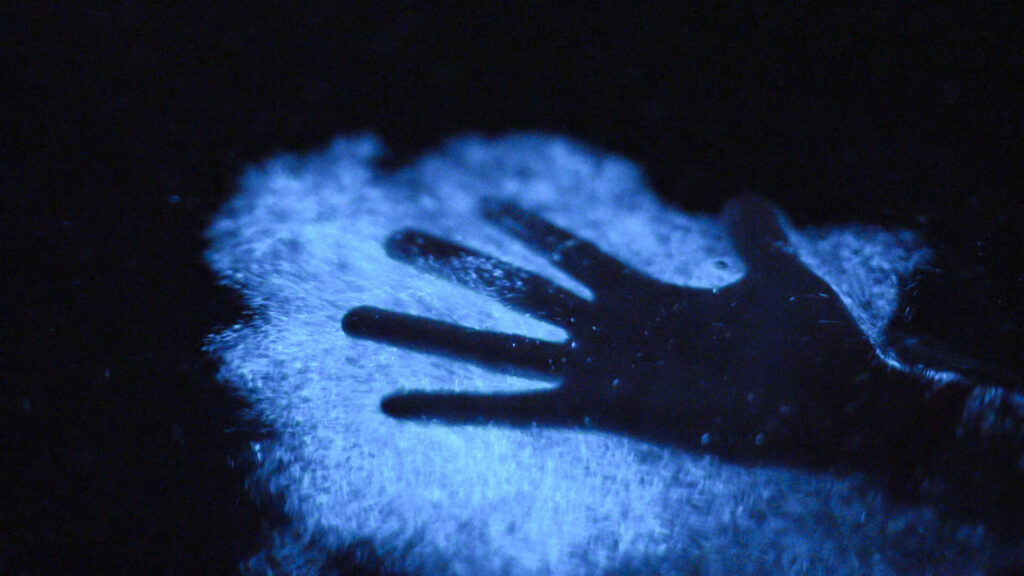 Dark image of of hand