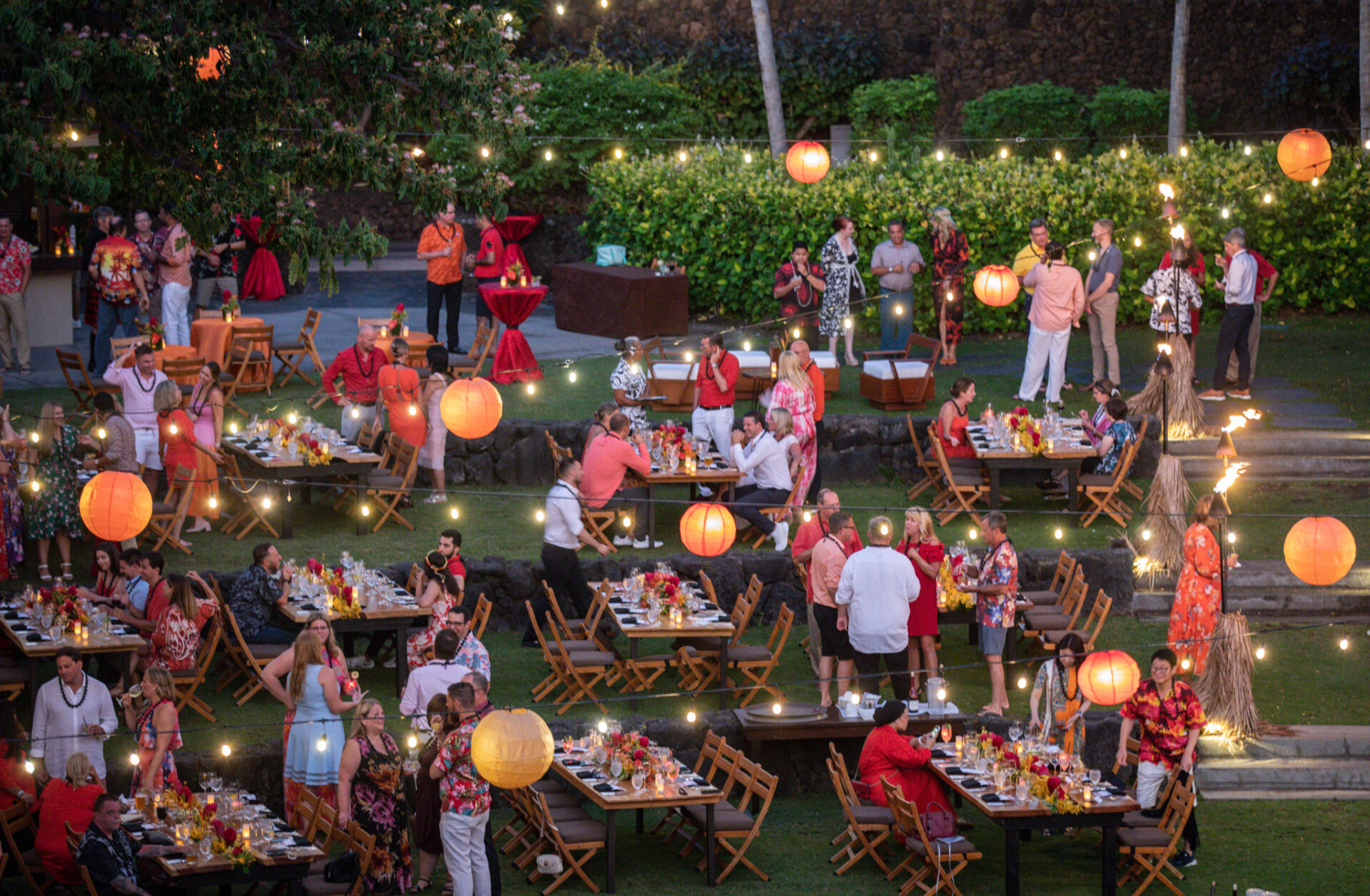 People seated at tables during an event
